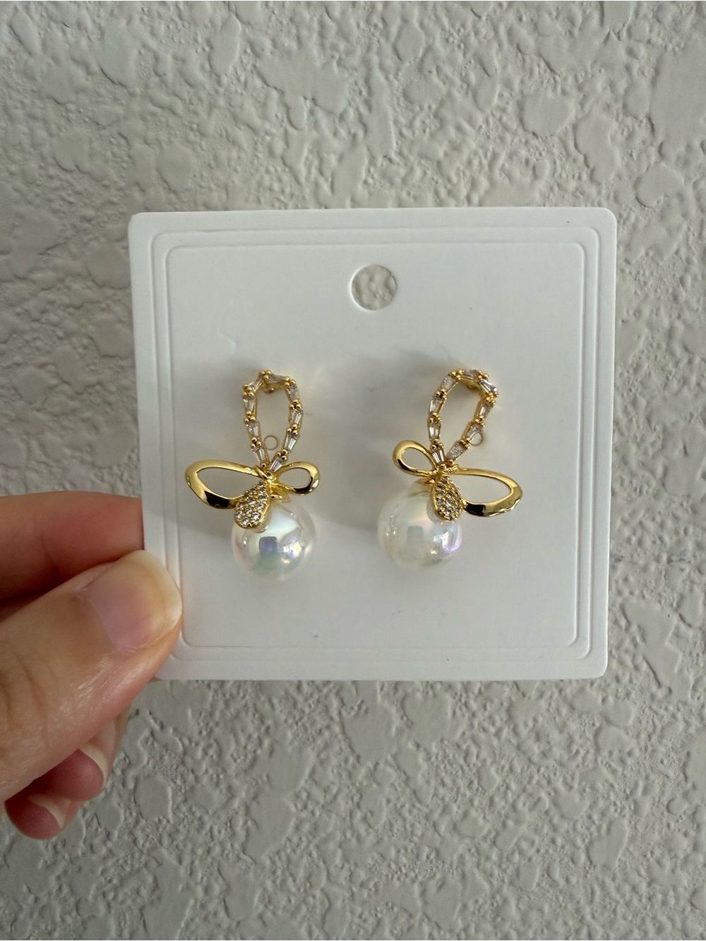 Women’s golden bow knots pearl earrings